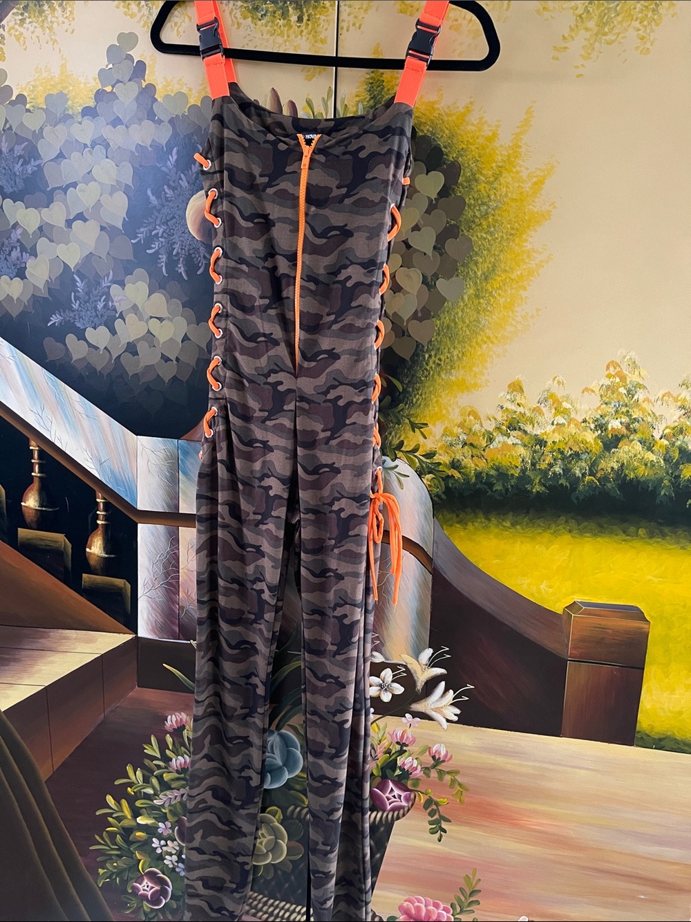Fashion Nova Camo Jumpsuit with Neon Orange Accents